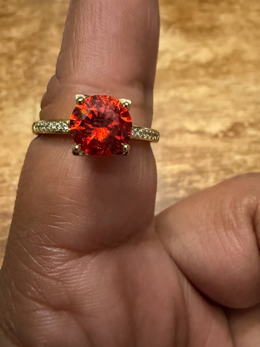 Gold Band Ring with Vibrant Orange Red Gemstone